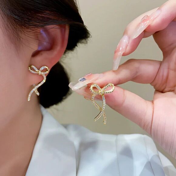 Crystal Bow Earrings in Gold - Picture 7 of 10